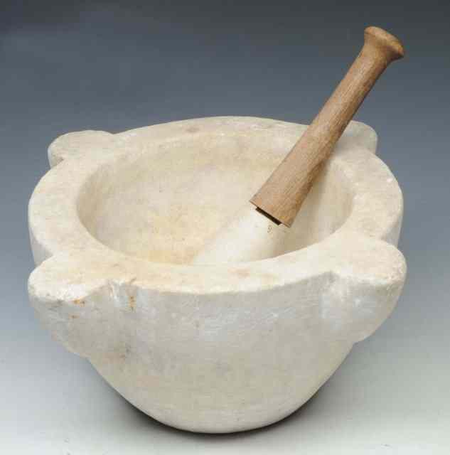 Appraisal: A LARGE MARBLE MORTAR with wood and marble pestle diameter