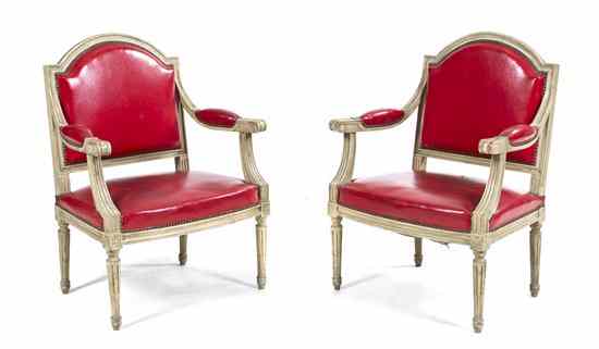 Appraisal: A Pair of Louis XVI Style Painted Fauteuils having upholstered