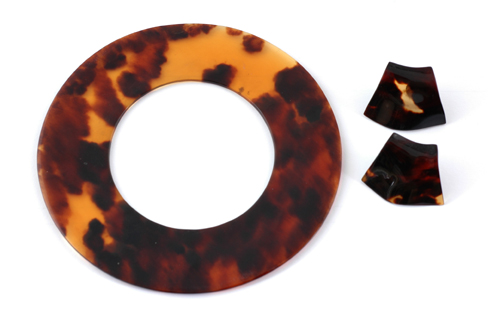 Appraisal: A handcrafted tortoiseshell bangle and pair of earrings by Phillip