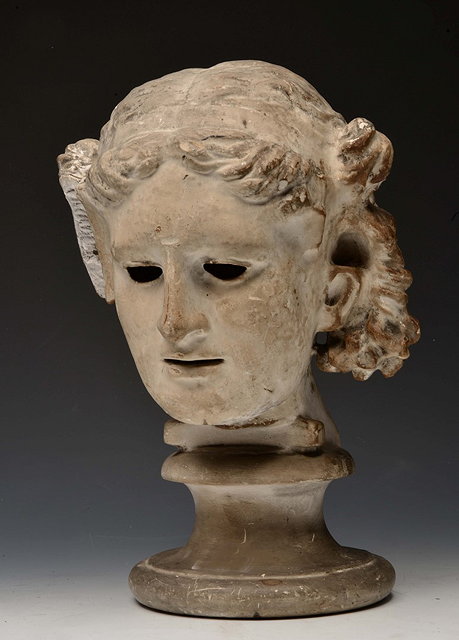 Appraisal: A PLASTER BUST AFTER THE ANTIQUE of a female head