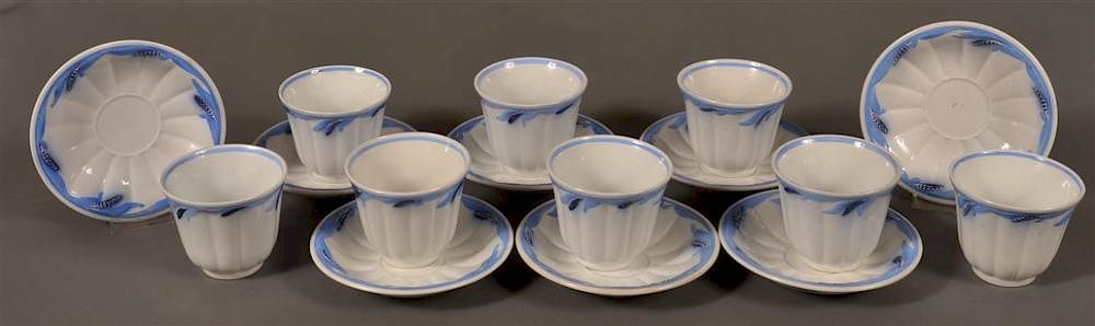 Appraisal: Ironstone Blue Wheat Pattern Cups Saucers Set of Eight Ironstone