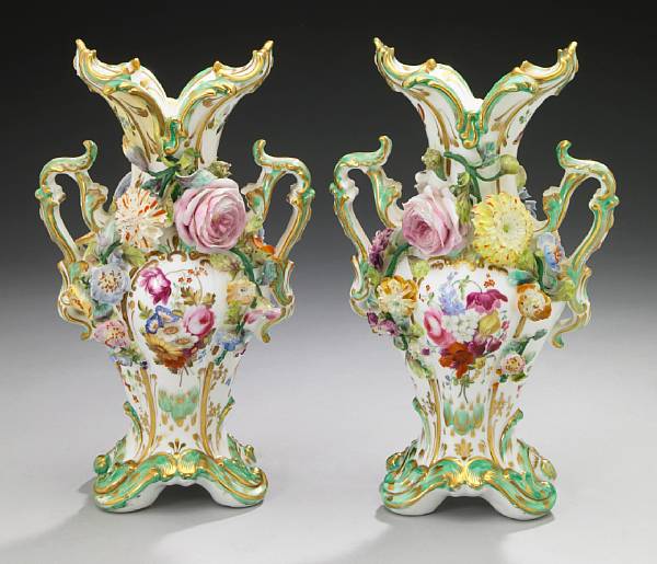 Appraisal: A pair of English porcelain floral encrusted vases possibly Coalport