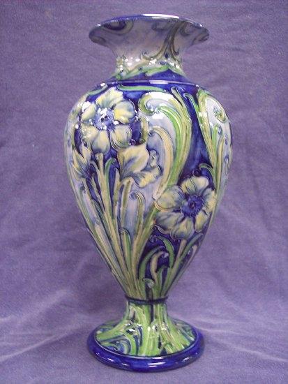 Appraisal: A Florian Ware baluster vase decorated daffodils in Blue green