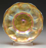 Appraisal: TIFFANY STUDIOS UNDERPLATE Iridescent gold finish with purple highlights scalloped