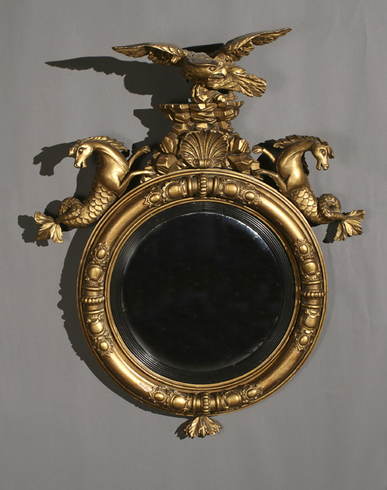 Appraisal: Regency Parcel Ebonized Giltwood Convex Mirror Circa Regilded some losses