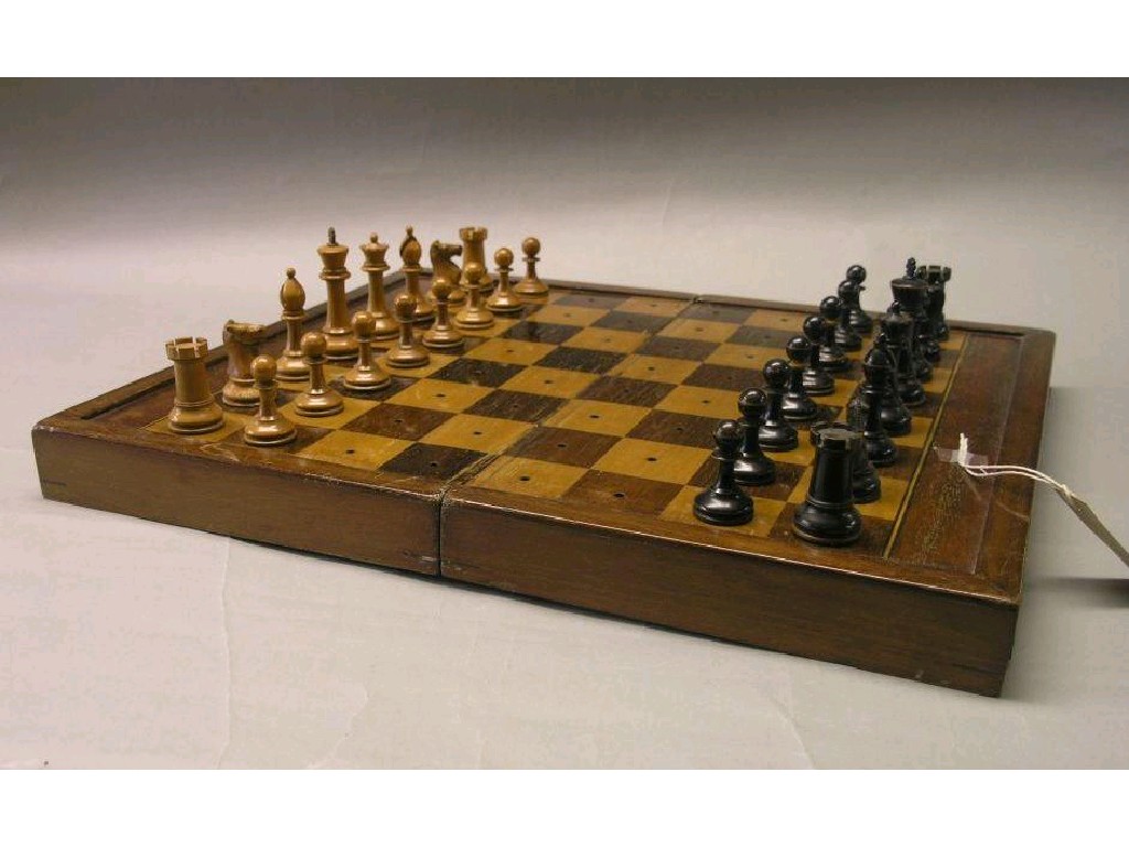 Appraisal: A travelling chess set in inlaid folding case Staunton pattern