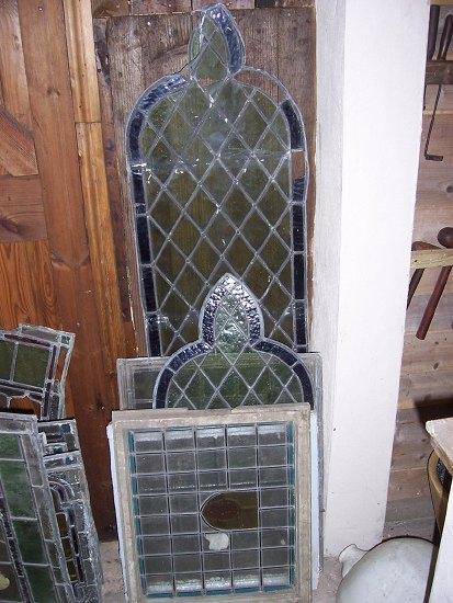 Appraisal: An arch top stained glass leaded light two leaded window