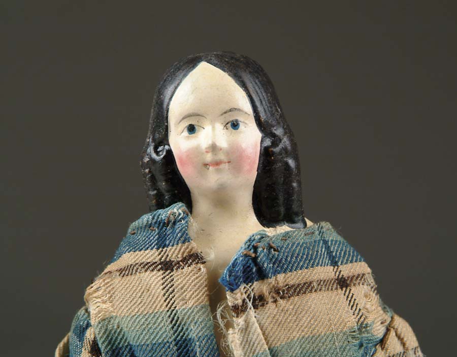 Appraisal: PAPER MACHE WITH RARE HAIR STYLE An elaborate hairdo on