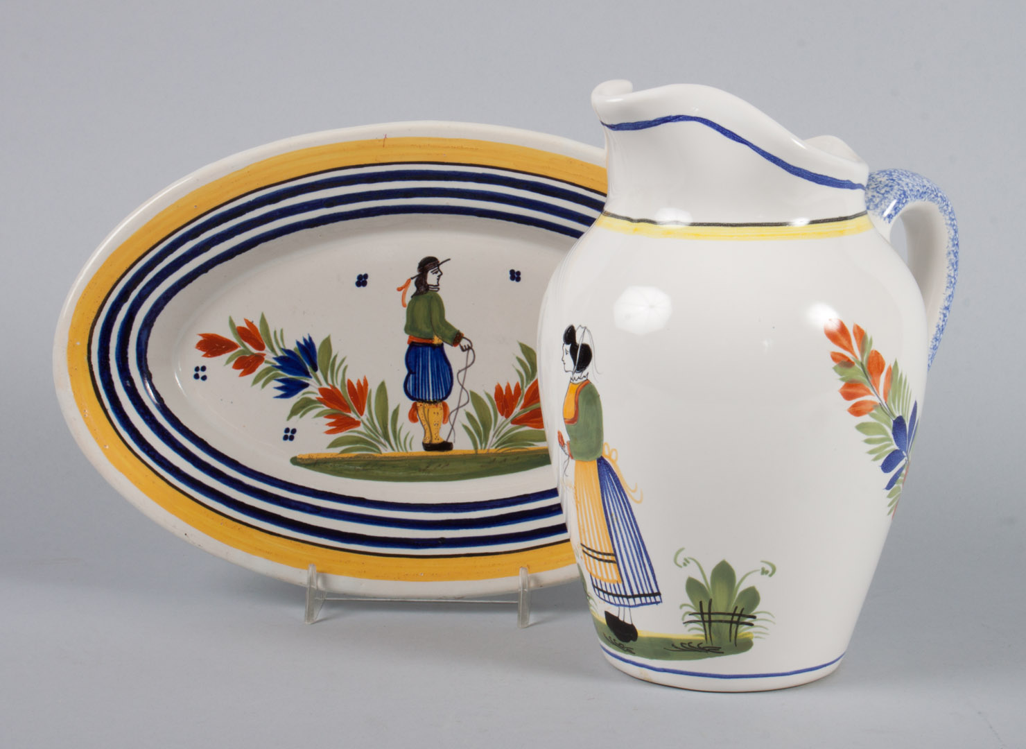 Appraisal: Henriot Quimper faience jug and small platter in H of