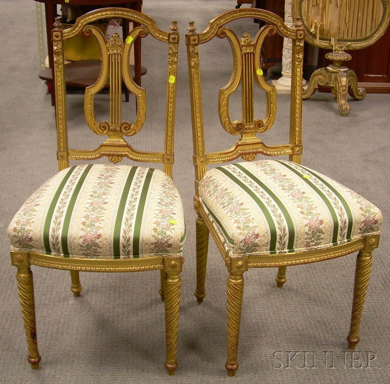 Appraisal: Pair of Neoclassical Upholstered Carved Giltwood Lyre-back Parlor Side Chairs