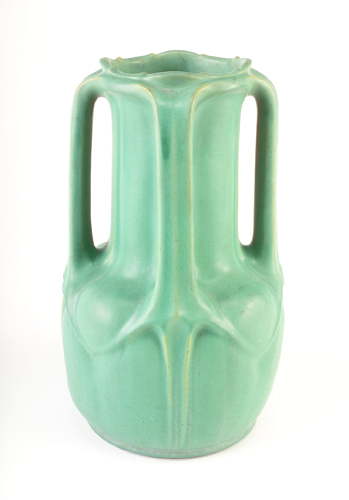 Appraisal: TECO Fine and large vase with four webbed handles covered