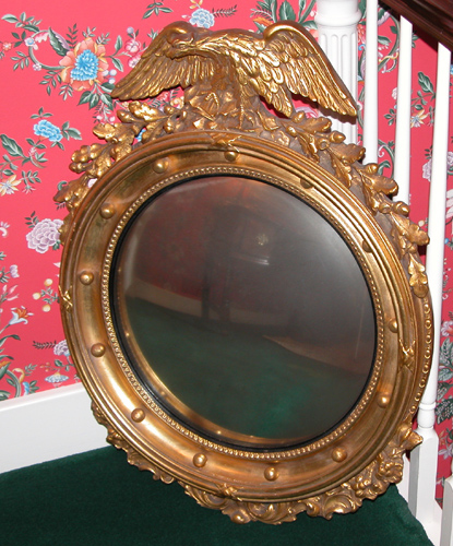 Appraisal: Federal Style Carved and Gilded Bulls-Eye Mirror with Eagle th