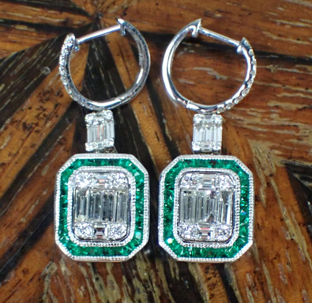 Appraisal: PAIR OF DIAMOND AND EMERALD DANGLE EARRINGS each k white