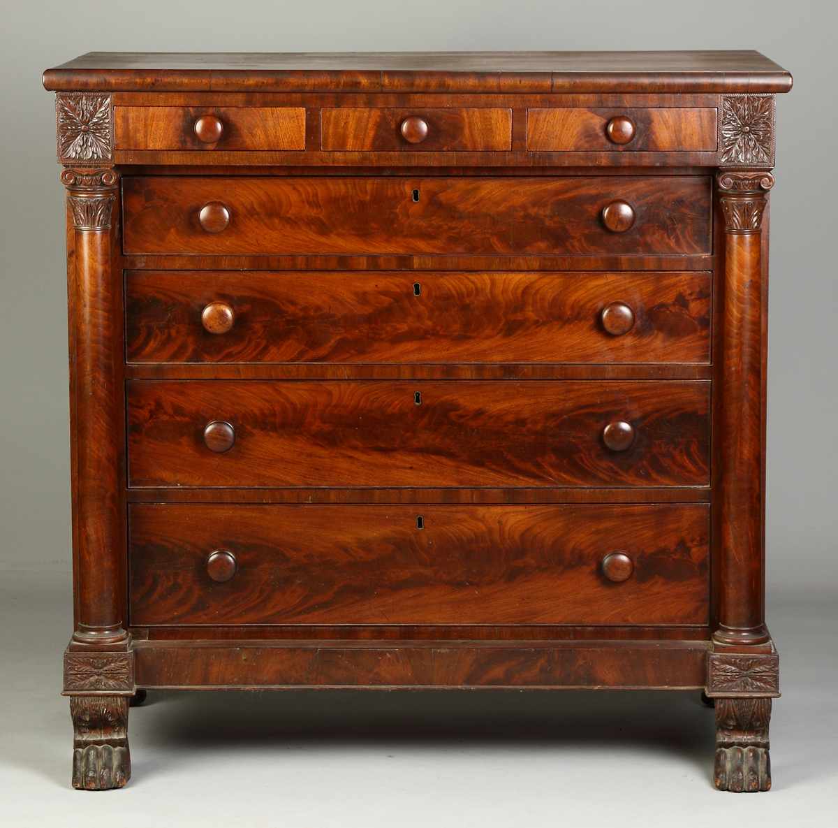 Appraisal: Empire Mahogany Chest C W columns paw feet etc Condition