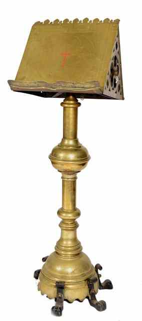 Appraisal: A VICTORIAN BRASS ECCLESIASTICAL LECTERN with red enamel Holy Cross