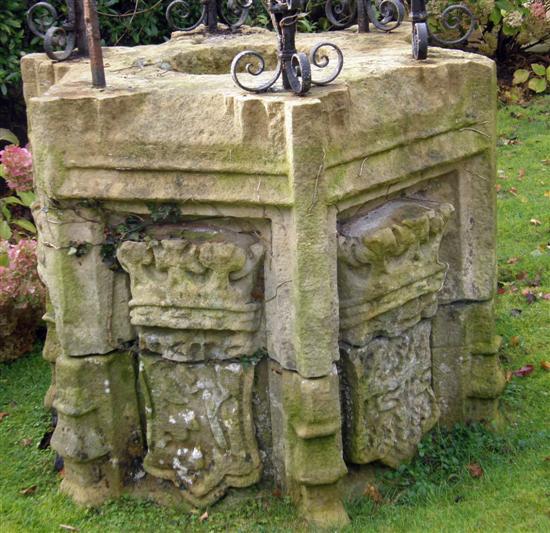 Appraisal: Hexagonal carved stone well-head carved in relief with alternating shields