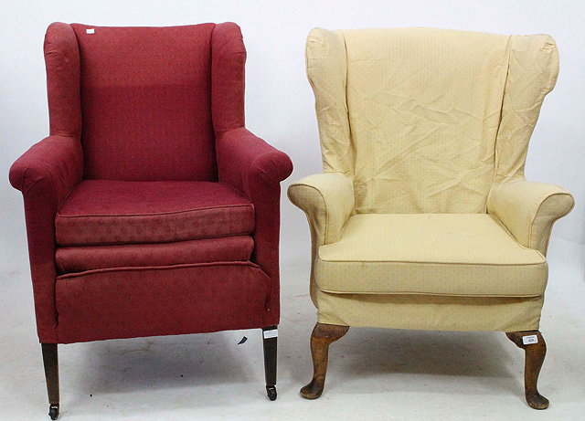 Appraisal: A QUEEN ANNE RE-UPHOLSTERED WING BACK ARMCHAIR and a Victorian