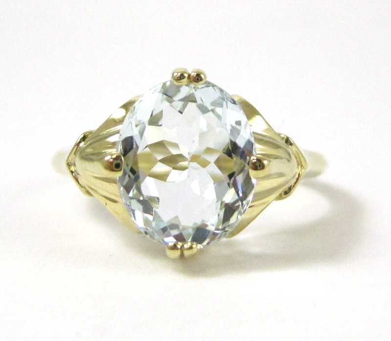 Appraisal: FOURTEEN KARAT GOLD AND AQUAMARINE SOLITAIRE RING single oval mixed-cut