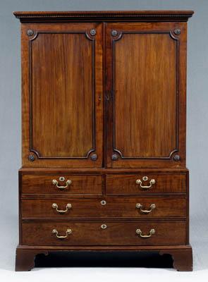 Appraisal: Georgian mahogany linen press two-case construction with figured mahogany veneers