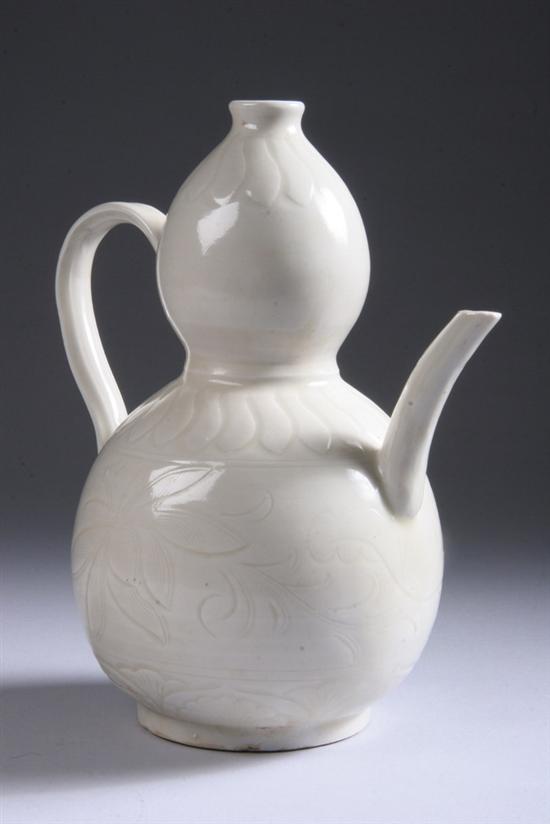 Appraisal: CHINESE MONOCHROME WHITE PORCELAIN-DOUBLE GOURD EWER Qing Dynasty Incised with