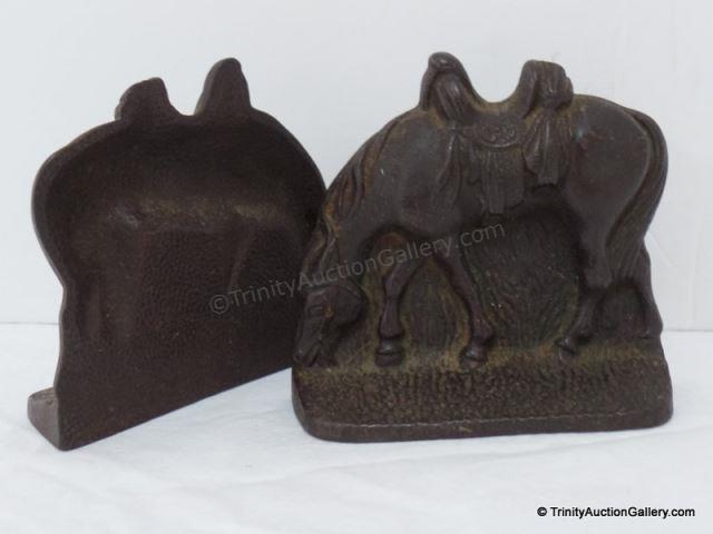 Appraisal: Antique Cast Iron Saddled Horse Bookends A nice pair of