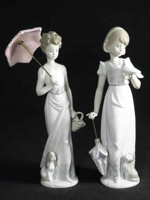 Appraisal: Lot of two Lladro Spanish porcelain figurines Includes ''Summer Stroll''