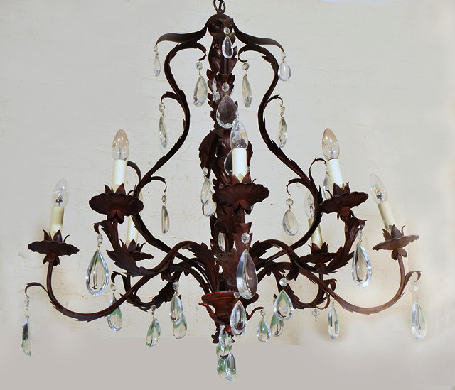 Appraisal: A FRENCH STYLE SEVEN-LIGHT BRONZED CHANDELIER with scrolling acanthus leaf