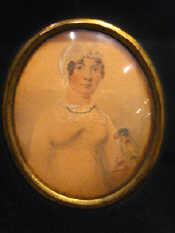 Appraisal: A Victorian watercolour miniature of a lady with parrot x