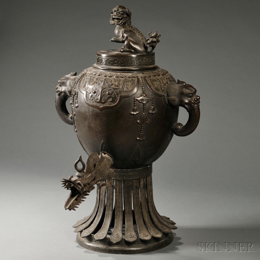 Appraisal: Bronze Covered Urn China ovoid body with dragon-form handles and