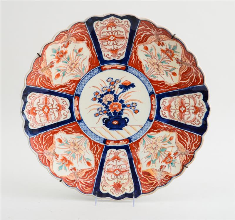 Appraisal: JAPANESE IMARI PORCELAIN CHARGER Unmarked with alternating iron red and