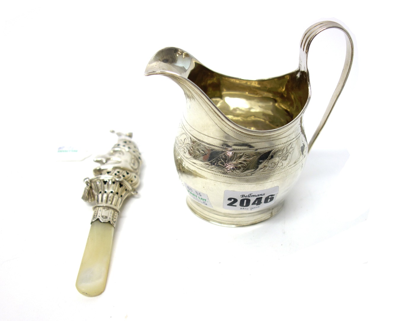 Appraisal: A George III silver helmet shaped milk jug decorated with