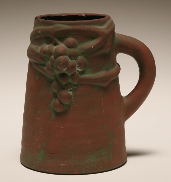 Appraisal: Peters Reed Moss Aztec art pottery tankard designed by Frank