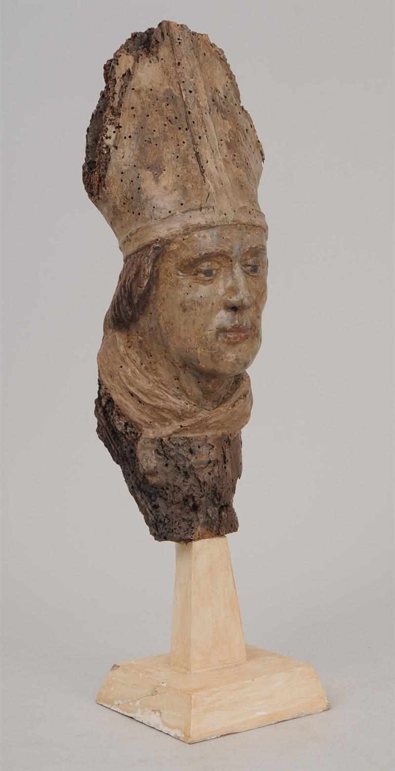 Appraisal: ITALIAN CARVED POLYCHROME WOOD HEAD OF A BISHOP SAINT With