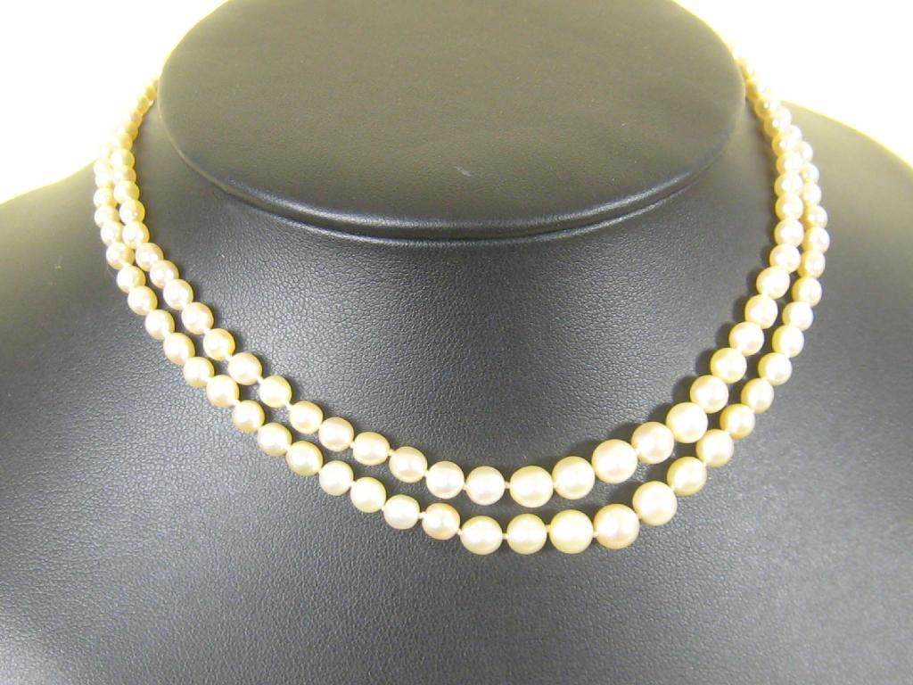 Appraisal: A child's double row graduated cultured Pearl Necklace with diamond