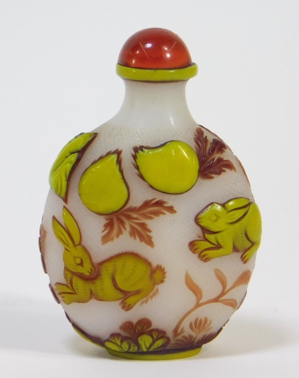 Appraisal: CHINESE CARVED PEKING GLASS RABBIT SNUFF BOTTLE China th CenturyThree