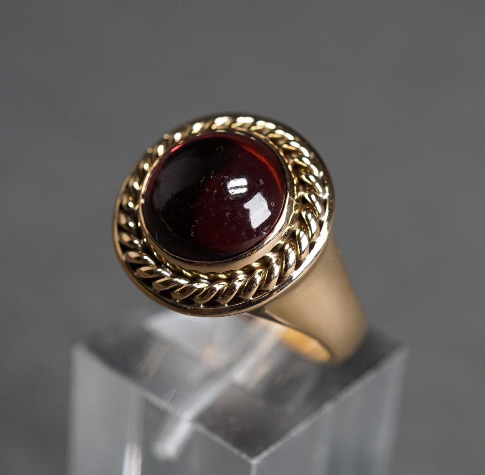 Appraisal: TESTED -KARAT YELLOW-GOLD AND CABOCHON GARNET RING GROSS DWT SIZE