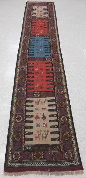 Appraisal: PERSIAN TRIBAL SOUMAK FLATWEAVE RUNNER hand woven featuring a row