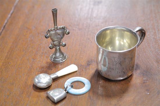 Appraisal: FOUR STERLING SILVER CHILDREN'S ITEMS A handled ABC cup depicting