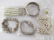 Appraisal: A quantity of white metal tests silver costume jewellery