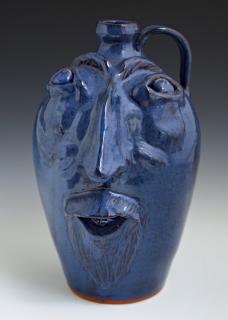 Appraisal: Jack T Maness Face Jug th c two pieces of