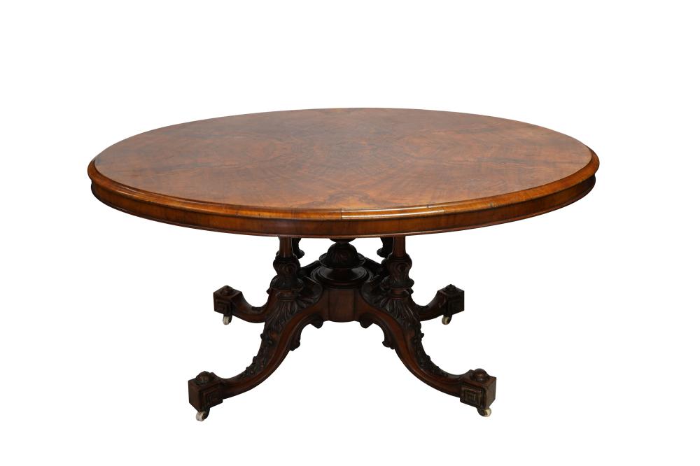 Appraisal: VICTORIAN FIGURED WALNUT LOO TABLEthe oval top on a carved