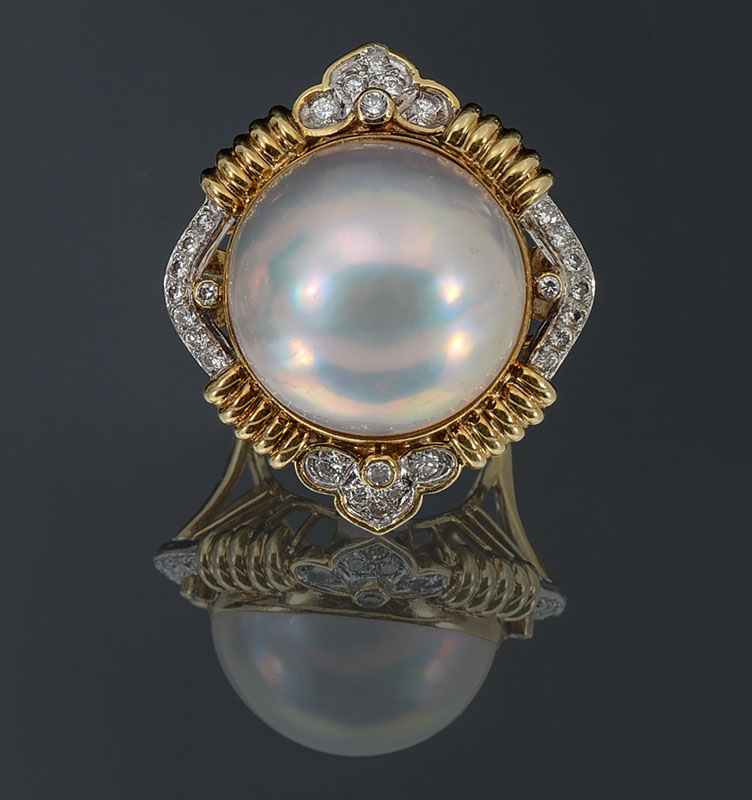 Appraisal: K MABE PEARL DIAMOND RING K yellow gold ring contains