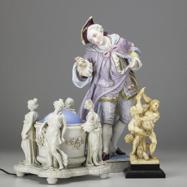 Appraisal: PORCELAIN GROUPING Three items European male figure in th C