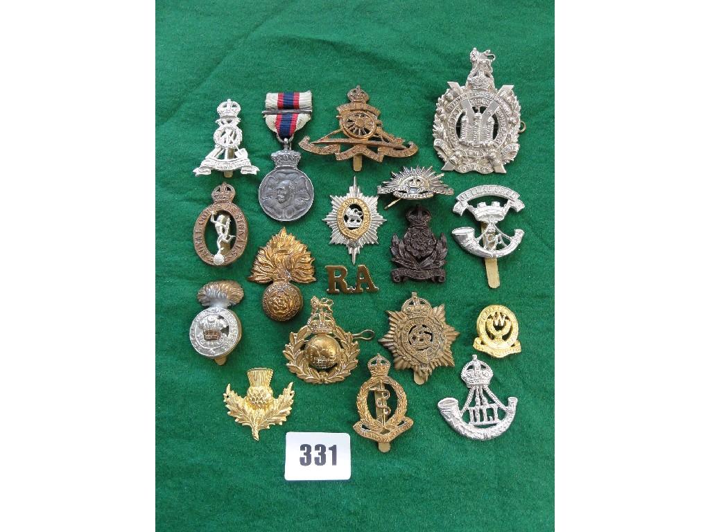 Appraisal: A small collection of various cast military cap badges etc