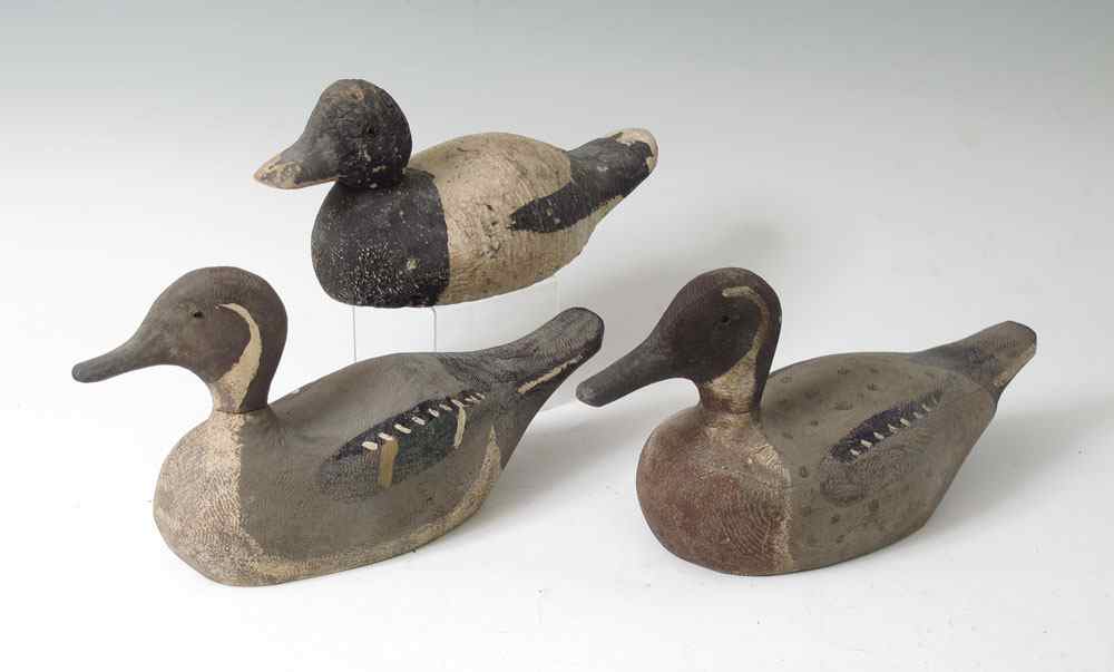 Appraisal: COLLECTION OF WORKING DUCK DECOYS All unidentified as to maker