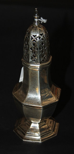 Appraisal: A GEORGIAN STYLE SILVER CASTER of tapering octagonal baluster form