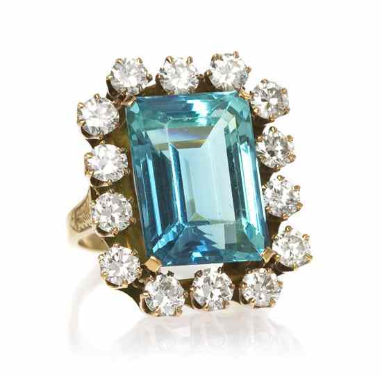 Appraisal: A Karat Yellow Gold Simulated Aquamarine and Diamond Ring containing