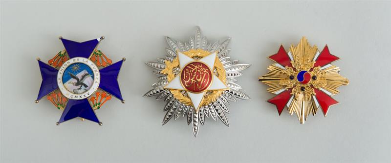 Appraisal: THREE MODERN ENAMELED-METAL DIPLOMATIC BADGES x in Ambassador and Mrs