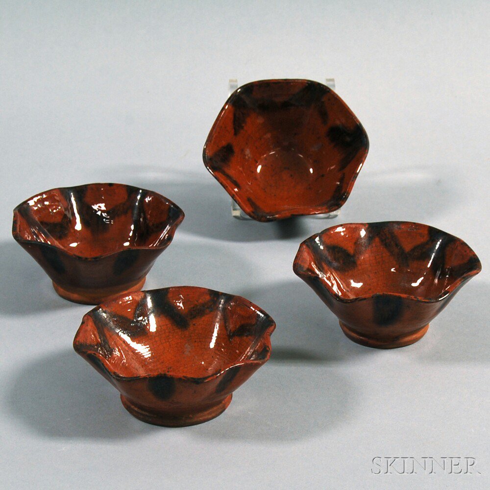 Appraisal: Set of Four Redware Custard Cups America th century minor