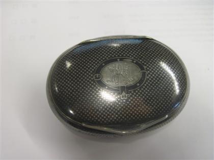 Appraisal: Russian silver niello tobacco boxOval centered by a cartouche and